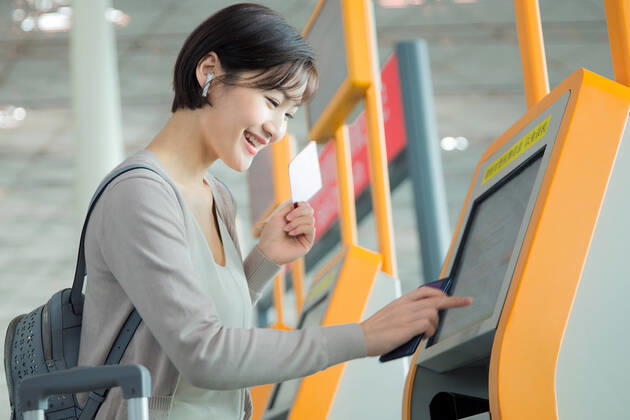 Business lady in the airport to use automatic machines China, 12 04 2019, model released, Copyright: xViewxStockx, cpmh-185321f10w.jpg, Travel,Business Travel,Business,Businesswoman,Airport,Women,Beauty,Ticket Machine,Automated,Buying,Convenience,Airport Lounge,Lobby,china,One Person,Headphones,Mobile Phone,Internet,Human Finger,Touching,Cursor,Visual Screen,Tourist,Business Person,White Collar Worker,Journey,back pack,East Asia,Oriental Ethnicity,Adult,People,Chinese Ethnicity,Asian and Indian Ethnicities,Indoors,Day,Horizontal,Photography,Color Image,Asia,Tourism,Air Transport Building,Young Adult,Young Women,Airplane Ticket,Aerospace Industry,Public Utility,Mode of Transport,25-29 Years Copyright: xViewxStockx