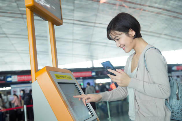 Business lady in the airport to use automatic machines China, 12 04 2019, model released, Copyright: xViewxStockx, cpmh-185333f10w.jpg, Travel,Business Travel,Business,Businesswoman,Airport,Women,Beauty,Ticket Machine,Automated,Buying,Convenience,Airport Lounge,Lobby,china,One Person,Holding,Mobile Phone,Internet,Cursor,Visual Screen,Tourist,Business Person,White Collar Worker,Journey,back pack,East Asia,Oriental Ethnicity,Adult,People,Chinese Ethnicity,Asian and Indian Ethnicities,Indoors,Day,Horizontal,Photography,Color Image,Asia,Tourism,Air Transport Building,Young Adult,Young Women,Airplane Ticket,Aerospace Industry,Public Utility,Mode of Transport,25-29 Years Copyright: xViewxStockx