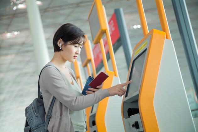Business lady in the airport to use automatic machines China, 12 04 2019, model released, Copyright: xViewxStockx, cpmh-185233f07w.jpg, Travel,Business Travel,Business,Businesswoman,Airport,Women,Beauty,Ticket Machine,Automated,Buying,Convenience,Airport Lounge,Lobby,china,One Person,Holding,Passport,Human Finger,Touching,Cursor,Visual Screen,Tourist,Business Person,White Collar Worker,Journey,back pack,East Asia,Oriental Ethnicity,Adult,People,Chinese Ethnicity,Asian and Indian Ethnicities,Indoors,Day,Horizontal,Photography,Color Image,Asia,Tourism,Air Transport Building,Young Adult,Young Women,Airplane Ticket,Aerospace Industry,Public Utility,Mode of Transport,25-29 Years Copyright: xViewxStockx