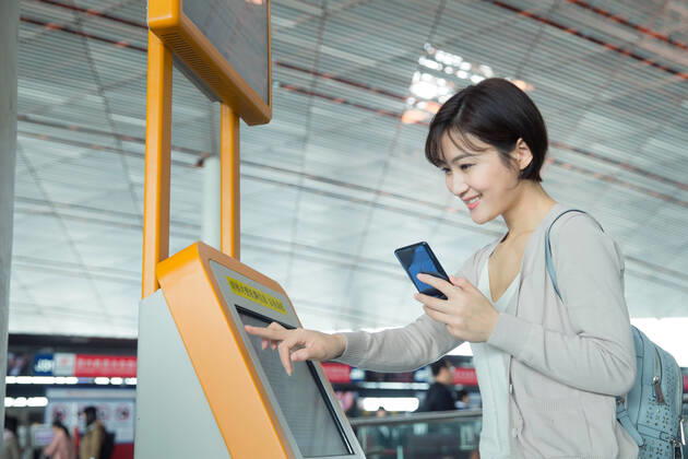 Business lady in the airport to use automatic machines China, 12 04 2019, model released, Copyright: xViewxStockx, cpmh-185243f07w.jpg, Travel,Business Travel,Business,Businesswoman,Airport,Women,Beauty,Ticket Machine,Automated,Buying,Convenience,Airport Lounge,Lobby,china,One Person,Holding,Mobile Phone,Internet,Cursor,Human Finger,Touching,Visual Screen,Tourist,Business Person,White Collar Worker,Journey,back pack,East Asia,Oriental Ethnicity,Adult,People,Chinese Ethnicity,Asian and Indian Ethnicities,Indoors,Day,Horizontal,Photography,Color Image,Asia,Tourism,Air Transport Building,Young Adult,Young Women,Airplane Ticket,Aerospace Industry,Public Utility,Mode of Transport,25-29 Years Copyright: xViewxStockx
