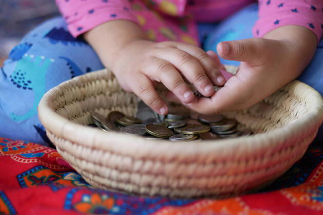child girl pile coin for saving. sitting on floor child girl pile coin for saving. Copyright: xx 43816268