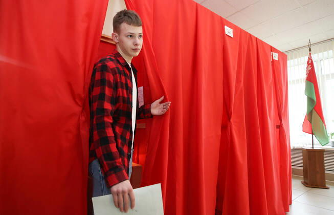 GRODNO, BELARUS - FEBRUARY 22, 2022: A man visits polling station No 65 at the Grodno Regional Institute of Education Development with the start of early voting in the 2022 Belarusian constitutional referendum, which is scheduled for February 27. Leonid Shcheglov BelTA TASS  TS124EA0