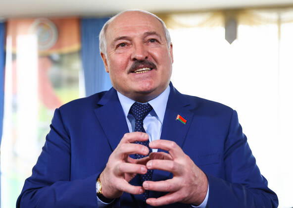 MINSK, BELARUS - FEBRUARY 27, 2022: Belarusian President Alexander Lukashenko talks to reporters at a polling station after casting his vote in the 2022 Belarusian constitutional referendum. In August 2020, mass protests erupted in major cities across Belarus after the results of the 2020 Belarusian presidential election were announced. Belarusian President Lukashenko announced plans for amendments to the constitution and his readiness to redistribute presidential powers to the other branches of government. Peter Kovalev TASS  TS125915