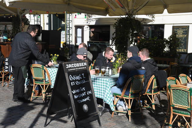 Copenhagen Denmark.04..March 2022 .Torits enjoy sun shine weather boat cruising enjoy food and drinks at cafe adn bars and restaurant on Nyhavn canal in danish capital. (Photo..Francis Dean Dean Pictures)
