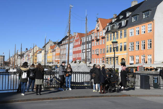Copenhagen Denmark.04..March 2022 .Torits enjoy sun shine weather boat cruising enjoy food and drinks at cafe adn bars and restaurant on Nyhavn canal in danish capital. (Photo..Francis Dean Dean Pictures)