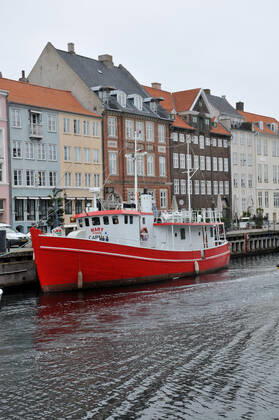Copenhagen Denmark.08 March 2022 .Torits enjoy sun shine weather boat cruising enjoy food and drinks at cafe adn bars and restaurant on Nyhavn canal in danish capital. (Photo..Francis Dean Dean Pictures)