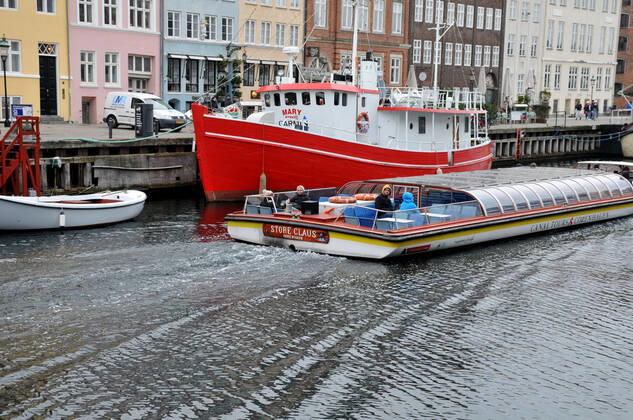 Copenhagen Denmark.08 March 2022 .Torits enjoy sun shine weather boat cruising enjoy food and drinks at cafe adn bars and restaurant on Nyhavn canal in danish capital. (Photo..Francis Dean Dean Pictures)