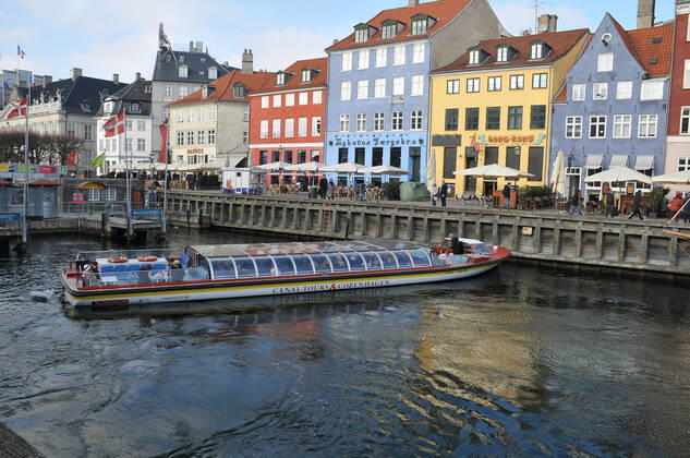 Copenhagen Denmark.10 March 2022 .Torits enjoy sun shine weather boat cruising enjoy food and drinks at cafe adn bars and restaurant on Nyhavn canal in danish capital. (Photo..Francis Dean Dean Pictures)