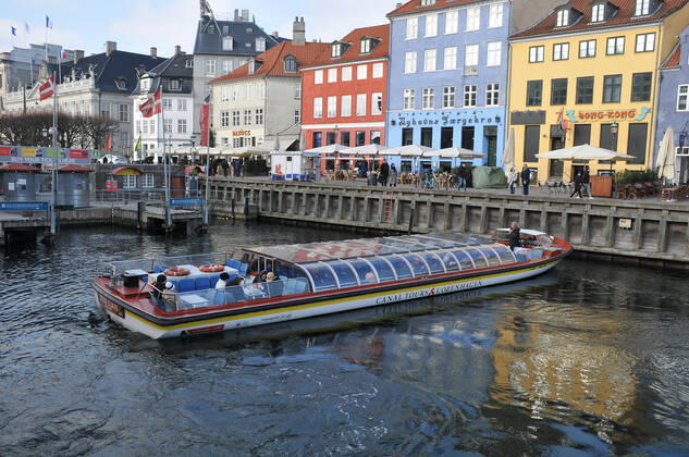 Copenhagen Denmark.10 March 2022 .Torits enjoy sun shine weather boat cruising enjoy food and drinks at cafe adn bars and restaurant on Nyhavn canal in danish capital. (Photo..Francis Dean Dean Pictures)