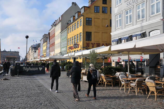 Copenhagen Denmark.10 March 2022 .Torits enjoy sun shine weather boat cruising enjoy food and drinks at cafe adn bars and restaurant on Nyhavn canal in danish capital. (Photo..Francis Dean Dean Pictures)