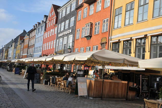 Copenhagen Denmark.10 March 2022 .Torits enjoy sun shine weather boat cruising enjoy food and drinks at cafe adn bars and restaurant on Nyhavn canal in danish capital. (Photo..Francis Dean Dean Pictures)