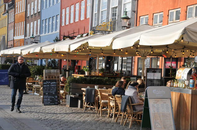 Copenhagen Denmark.10 March 2022 .Torits enjoy sun shine weather boat cruising enjoy food and drinks at cafe adn bars and restaurant on Nyhavn canal in danish capital. (Photo..Francis Dean Dean Pictures)
