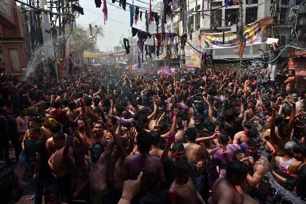 March 18, 2022, Prayagraj, Uttar Pradesh, India: Prayagraj: Revelers celebrate the Hindu spring festival of Holi in Allahabad on March 18, 2022. Prayagraj India - ZUMAv115 20220318_zap_v115_004 Copyright: xPrabhatxKumarxVermax