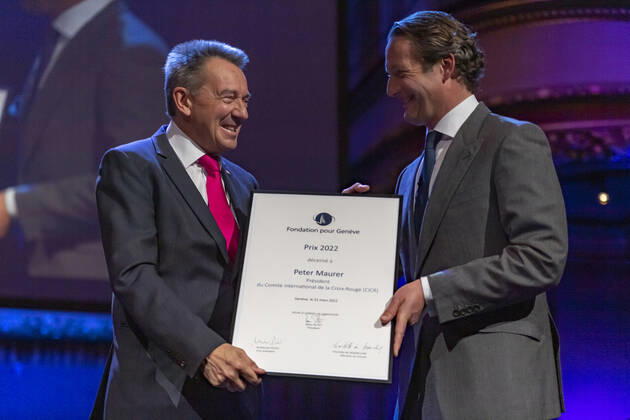 Switzerland: Foundation Award Ceremony for Geneva 2022 Peter Maurer (President of ICRC) (L) receives the Foundation Prize for Geneva for his work with the International Committee of the Red Cross, from the hand of the Marc Pictet (Director of the Pictet group) (R) during the Foundation Award Ceremony for Geneva 2022. Geneva Switzerland Switzerland Copyright: EricxDubost