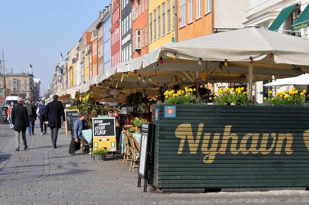 Copenhagen Denmark.22 March 2022 .Torits enjoy sun shine weather boat cruising enjoy food and drinks at cafe adn bars and restaurant on Nyhavn canal in danish capital. (Photo..Francis Dean Dean Pictures)