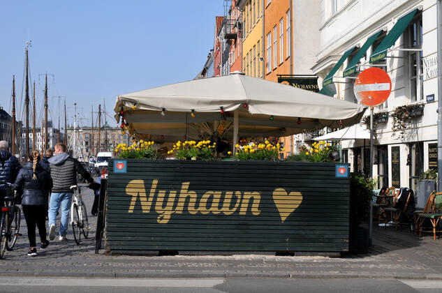 Copenhagen Denmark.22 March 2022 .Torits enjoy sun shine weather boat cruising enjoy food and drinks at cafe adn bars and restaurant on Nyhavn canal in danish capital. (Photo..Francis Dean Dean Pictures)
