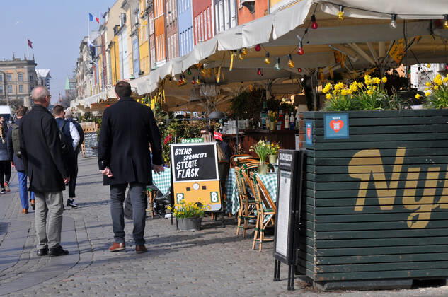 Copenhagen Denmark.22 March 2022 .Torits enjoy sun shine weather boat cruising enjoy food and drinks at cafe adn bars and restaurant on Nyhavn canal in danish capital. (Photo..Francis Dean Dean Pictures)