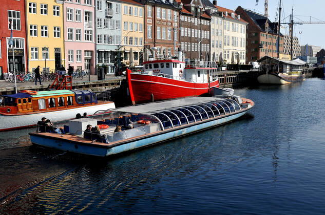 Copenhagen Denmark.22 March 2022 .Torits enjoy sun shine weather boat cruising enjoy food and drinks at cafe adn bars and restaurant on Nyhavn canal in danish capital. (Photo..Francis Dean Dean Pictures)