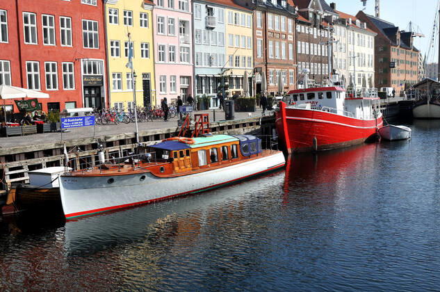 Copenhagen Denmark.22 March 2022 .Torits enjoy sun shine weather boat cruising enjoy food and drinks at cafe adn bars and restaurant on Nyhavn canal in danish capital. (Photo..Francis Dean Dean Pictures)