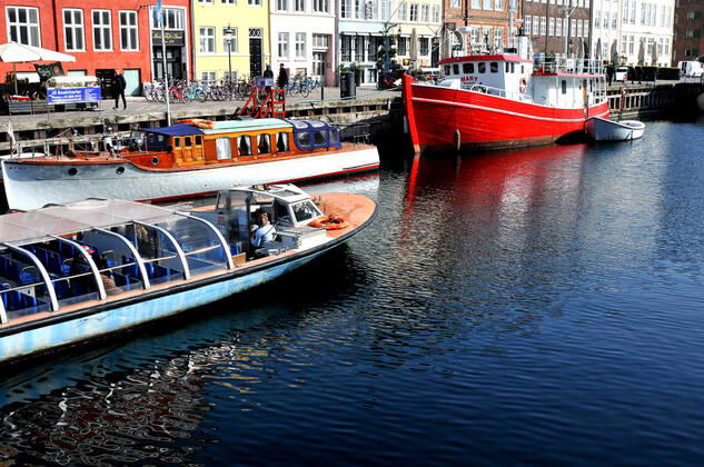 Copenhagen Denmark.22 March 2022 .Torits enjoy sun shine weather boat cruising enjoy food and drinks at cafe adn bars and restaurant on Nyhavn canal in danish capital. (Photo..Francis Dean Dean Pictures)