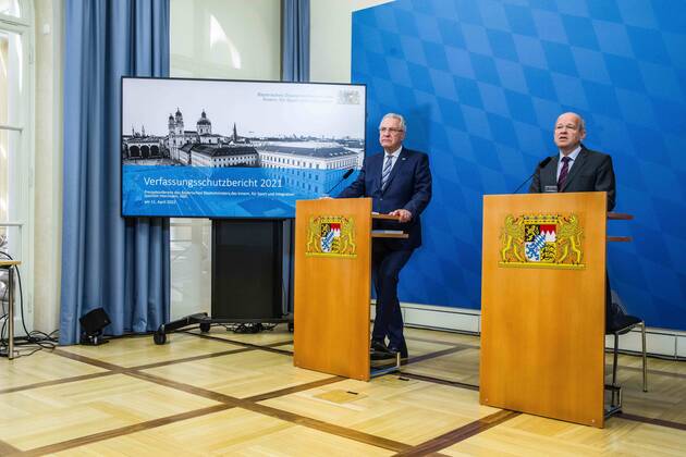 April 11, 2022, Munich, Bavaria, Germany: BURKHARD KOERNER (Burkhard Ko¶rner) Praesident of the Bavarian Verfassungsschutz with JOACHIM HERRMANN, Interior Minister of the State of Bavaria. The Bavarian Verfassungsschutz (Secret Service, Office for the Protection of the Constitution) released the 2021 report detailing threats to the state of Bavaria and the country. Over the past years, conspiracy theorists, new age and wellness extremists, right-extremists, and various enemies of democracy have taken a leading role against the German state and society, with imagery such as the August 2020 storming of the Reichstag and May 2020 3,000 Corona rebels demonstrating at Marienplatz in Munch associated with it. Numerous participants in that st - ZUMAb160 20220411_zbp_b160_027 Copyright: xSachellexBabbarx
