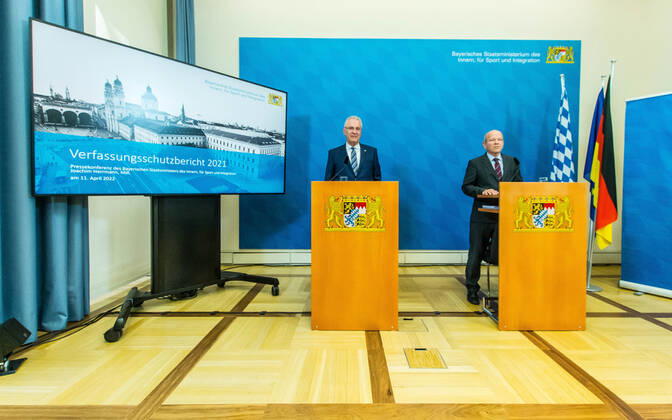 April 11, 2022, Munich, Bavaria, Germany: BURKHARD KOERNER (Burkhard Ko¶rner) Praesident of the Bavarian Verfassungsschutz with JOACHIM HERRMANN, Interior Minister of the State of Bavaria. The Bavarian Verfassungsschutz (Secret Service, Office for the Protection of the Constitution) released the 2021 report detailing threats to the state of Bavaria and the country. Over the past years, conspiracy theorists, new age and wellness extremists, right-extremists, and various enemies of democracy have taken a leading role against the German state and society, with imagery such as the August 2020 storming of the Reichstag and May 2020 3,000 Corona rebels demonstrating at Marienplatz in Munch associated with it. Numerous participants in that st - ZUMAb160 20220411_zbp_b160_047 Copyright: xSachellexBabbarx