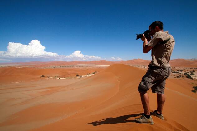 Photographer taking outdoor photos , 2057919.jpg, alone, background, camera, caucasian, desert, digital, equipment, hand, hobby, holding, human, job, journalist, lens, man, namibia, occupation, outdoor, people, person, photo, photograph, photographic, photographing, photography, portrait, professional, sand, shadow, shooting, shot, single, snapshot, sossusvlei, thirsty, top, verticality, winner, winning, young, zoom,