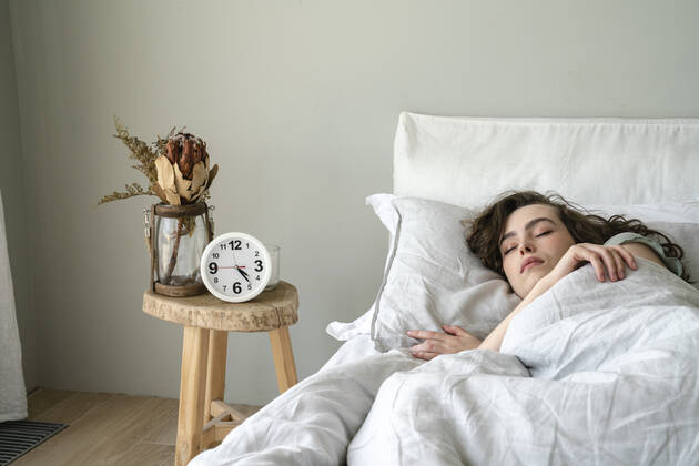 Woman sleeping in bed at home model released, Symbolfoto property released, VPIF06036