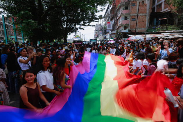 June 11, 2022, Kathmandu, Bagmati, Nepal: Members of LGBTQIA+ communities waves the rainbow flag during Fourth Annual Nepal Pride Parade,Kathmandu. The rainbow flag is a symbol of lesbian, gay, bisexual, transgender (LGBT) and queer pride and LGBT social movements. Kathmandu Nepal - ZUMAm204 20220611_zip_m204_001 Copyright: xAmitxMachamasix