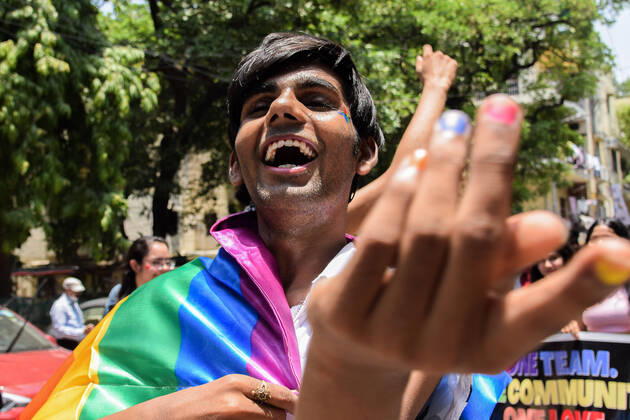 A Pride March in Delhi A Participant can be seen with a Pride Flag in a Pride March to celebrate Pride Month and spread awareness regarding the LGBTQ+ Community in New Delhi. India Copyright: KabirxJhangiani