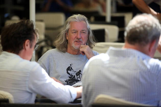 June 24, 2022, Krakow, Poland: The Grand Tour stars, Jeremy Clarkson, Richard Hammond and James May, take coffee on the Main Square in Cracow, Poland, while on tour filming the show. The Grand Tour is a British motoring television series, created by Jeremy Clarkson, Richard Hammond, James May, and Andy Wilman, made for Amazon exclusively for its online streaming service Amazon Prime Video which premiered in 2016. The programme was conceived in the wake of the departure of Clarkson, Hammond, May and Wilman from the BBC series Top Gear. Krakow Poland - ZUMAs197 20220624_zaa_s197_606 Copyright: xVitoxCorleonex
