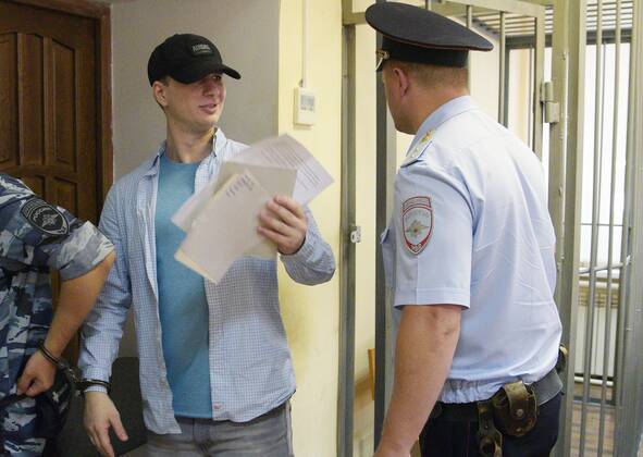 Russia US Citizen Trial 8230798 06.07.2022 28-year-old US citizen Robert Gilman, accused of using violence against a police officer, is seen after a court hearing on his case in the Central District Court, in Voronezh, Russia. Andrey Arhipov Sputnik Voronezh Russia  Copyright: xAndreyxArhipovx