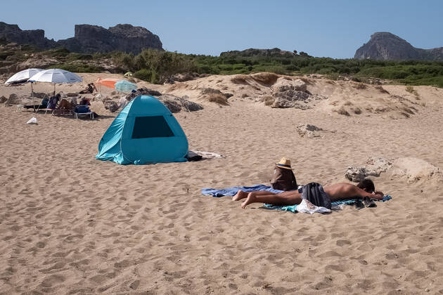 Tourism In Greece - Falassarna Beach In Crete Island People are enjoy their time at Falassarna beach near Chania, Crete Island, Greece on August 14, 2022. Falassarna is located 59 kilometers west of Chania. Today is one of the most famous destinations in Crete, for its beaches and for reasons of ecological interest. Falassarna Greece Copyright: xNikolasxKokovlisx originalFilename: kokovlis-notitle220814_npVOb