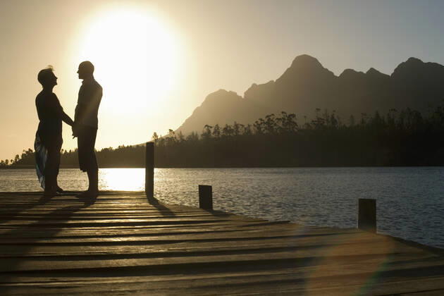 Senior Couple Standing On Edge Of Pier, model released, , property released, , 10007702.jpg, Adult, Baby Boomer, Cape Town, Caucasian, Countryside, Couple, Dock, Edge, Enjoying, Female, Happy, Holding Hands, Horizontal, Idyllic, Jetty, Lake, Leisure, Lensflare, Lourensford, Love, Male, Man, Men, Middle Age, Mountain, Nature, Outdoors, People, Person, Pier, Recreation, Relaxation, Retirement, Rural, Scenic, Side View, Silhouette, South Africa, Standing, Summer, Sunlight, Sunset, Togetherness, Two, Vacation, Water, Weekend, Woman, Women, 50s,