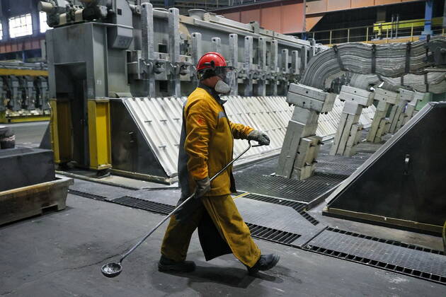 SHELEKHOV, IRKUTSK REGION, RUSSIA â€“ SEPTEMBER 27, 2022: A worker at the Irkutsk Aluminum Smelter (IrkAZ) operated by Rusal of the En+ Groupâ€™s Metals segment. The plant was commissioned in 1962. By 2022, the volume of aluminum production reached 422 thousand tonnes per year; it uses electricity generated at the Irkutsk Hydroelectric Power Station. Vladimir Smirnov TASS  TS144368