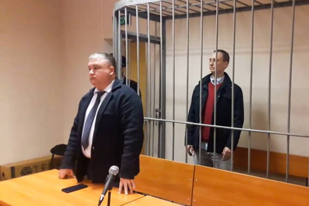 VORONEZH, RUSSIA - OCTOBER 4, 2022: Pictured in this video screen grab is US national Robert Gilman (R) as he appears for a sentencing hearing at the Voronezh Region Court. The court found Gilman guilty of violence against a representative of power and sentenced him to 4 and a half years in a penal colony. Gilman was detained and taken to a police station in Voronezh on 17 January 2022 for drunken behaviour on a train. According to the prosecution, Gilman kicked a police officer several times. Video grab. Best possible quality. Yelena Ruzanova TASS  TS1450D1