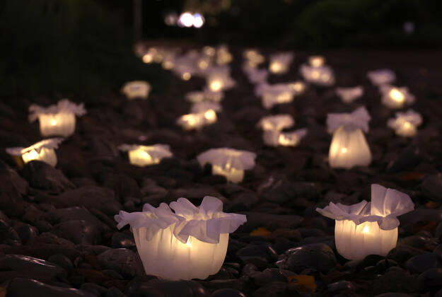 October 14, 2022, Tokyo, Japan - An installation as it is. -equilibrium flower- of some 2,000 flower like objects with small LED lights is displayed at a park of the Tokyo Midtown as a part of the Tokyo Midtown Design Touch 2022 in Tokyo on Friday, October 14, 2022. An annual design event with the theme of Design for Sustainable Future started at the Tokyo Midtown through November 3.  , aflo_201255383.jpg,