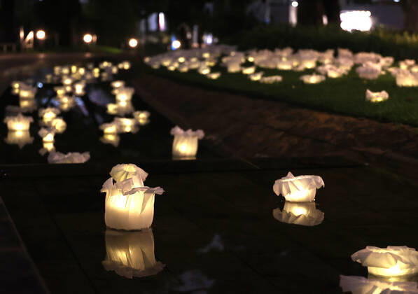 October 14, 2022, Tokyo, Japan - An installation as it is. -equilibrium flower- of some 2,000 flower like objects with small LED lights is displayed at a park of the Tokyo Midtown as a part of the Tokyo Midtown Design Touch 2022 in Tokyo on Friday, October 14, 2022. An annual design event with the theme of Design for Sustainable Future started at the Tokyo Midtown through November 3.  , aflo_201255388.jpg,
