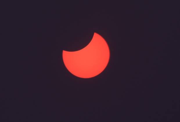 Picture shows a view of the moon partially obscuring the sun disk, This picture taken on October 25, 2022 shows a view of the moon partially obscuring the sun disk, seen behind an X-ray image as a filter, during a partial solar eclipse visible from Gaza City in the Palestinian Gaza Strip enclave. Photo by Ashraf Amra apaimages Gaza city Gaza Strip Palestinian Territory 251022_Gaza_ASH_3_00 (15) Copyright: xapaimagesxAshrafxAmrax xapaimagesx