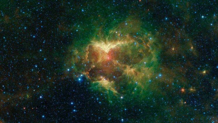 Bilder des Jahres 2022, News 10 Oktober News Themen der Woche KW44 News Bilder des Tages Aufnahme des Spitzer-Teleskops von der äusseren Milchstrasse October 31, 2022 - Space - While observing the outer region of the Milky Way galaxy, our Spitzer Telescope captured this infrared image of a cloud of gas and dust that looks like the hollowed-out pumpkins we see every Halloween. Nicknamed the Jack-o -Lantern Nebula, it was likely created by powerful outflows of radiation and particles from a massive O-type star, about 15 to 20 times heavier than the Sun. The data used to create this image was collected during Spitzer s cold mission, which ran between 2004 and 2009. Space - ZUMAz03_ 20221031_shl_z03_528 Copyright: xNASA JPL-Caltechx