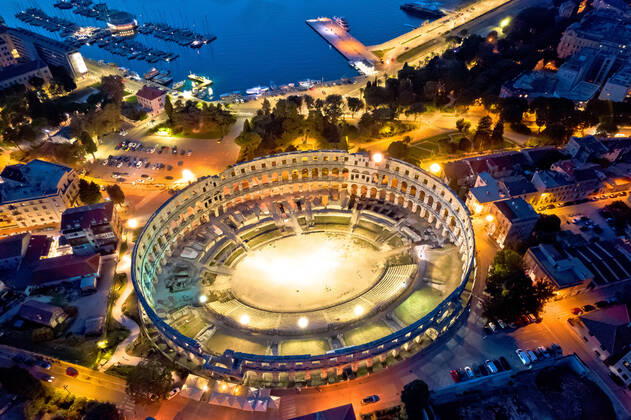 Arena Pula. Ancient ruins of Roman amphitheatre in Pula aerial evening view Arena Pula. Ancient ruins of Roman amphitheatre in Pula aerial evening view, Istria region of Croatia Copyright: xZoonar.com DaliborxBrlekx 17683496