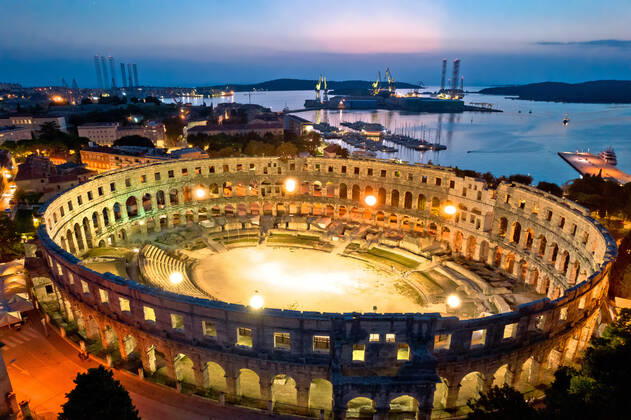 Arena Pula. Ancient ruins of Roman amphitheatre in Pula aerial evening view Arena Pula. Ancient ruins of Roman amphitheatre in Pula aerial evening view, Istria region of Croatia Copyright: xZoonar.com DaliborxBrlekx 17683532
