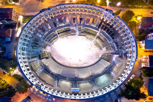 Arena Pula. Ancient ruins of Roman amphitheatre in Pula aerial evening view Arena Pula. Ancient ruins of Roman amphitheatre in Pula aerial evening view, Istria region of Croatia Copyright: xZoonar.com DaliborxBrlekx 18145051