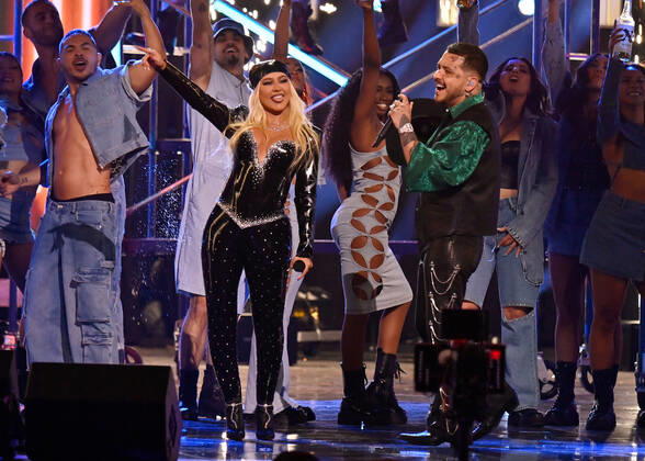 Christina Aguilera (L) and Christian Nodal perform onstage during the 23rd annual Latin Grammy Awards at the Michelob Ultra Arena at Mandalay Bay Resort and Casino in Las Vegas, Nevada on Thursday, November 17, 2022.  LAV20221117032 JIMxRUYMEN