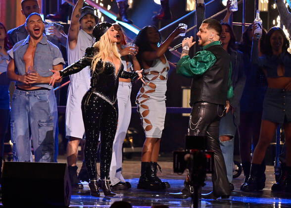 Christina Aguilera (L) and Christian Nodal perform onstage during the 23rd annual Latin Grammy Awards at the Michelob Ultra Arena at Mandalay Bay Resort and Casino in Las Vegas, Nevada on Thursday, November 17, 2022.  LAV20221117031 JIMxRUYMEN