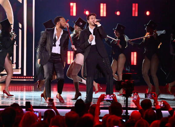 John Legend and Sebastián Yatra perform onstage during the 23rd annual Latin Grammy Awards at the Michelob Ultra Arena at Mandalay Bay Resort and Casino in Las Vegas, Nevada on Thursday, November 17, 2022.  LAV20221117680 JIMxRUYMEN