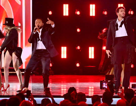 John Legend and Sebastián Yatra perform onstage during the 23rd annual Latin Grammy Awards at the Michelob Ultra Arena at Mandalay Bay Resort and Casino in Las Vegas, Nevada on Thursday, November 17, 2022.  LAV20221117681 JIMxRUYMEN