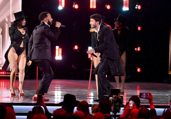 John Legend and Sebastián Yatra perform onstage during the 23rd annual Latin Grammy Awards at the Michelob Ultra Arena at Mandalay Bay Resort and Casino in Las Vegas, Nevada on Thursday, November 17, 2022.  LAV20221117684 JIMxRUYMEN