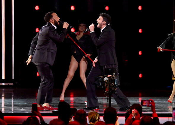 John Legend and Sebastián Yatra perform onstage during the 23rd annual Latin Grammy Awards at the Michelob Ultra Arena at Mandalay Bay Resort and Casino in Las Vegas, Nevada on Thursday, November 17, 2022.  LAV20221117685 JIMxRUYMEN