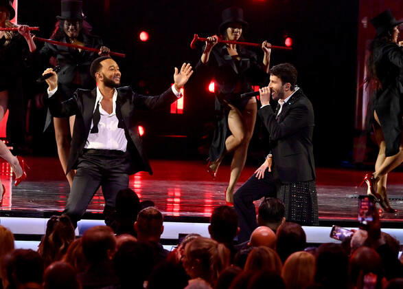 John Legend and Sebastián Yatra perform onstage during the 23rd annual Latin Grammy Awards at the Michelob Ultra Arena at Mandalay Bay Resort and Casino in Las Vegas, Nevada on Thursday, November 17, 2022.  LAV20221117691 JIMxRUYMEN